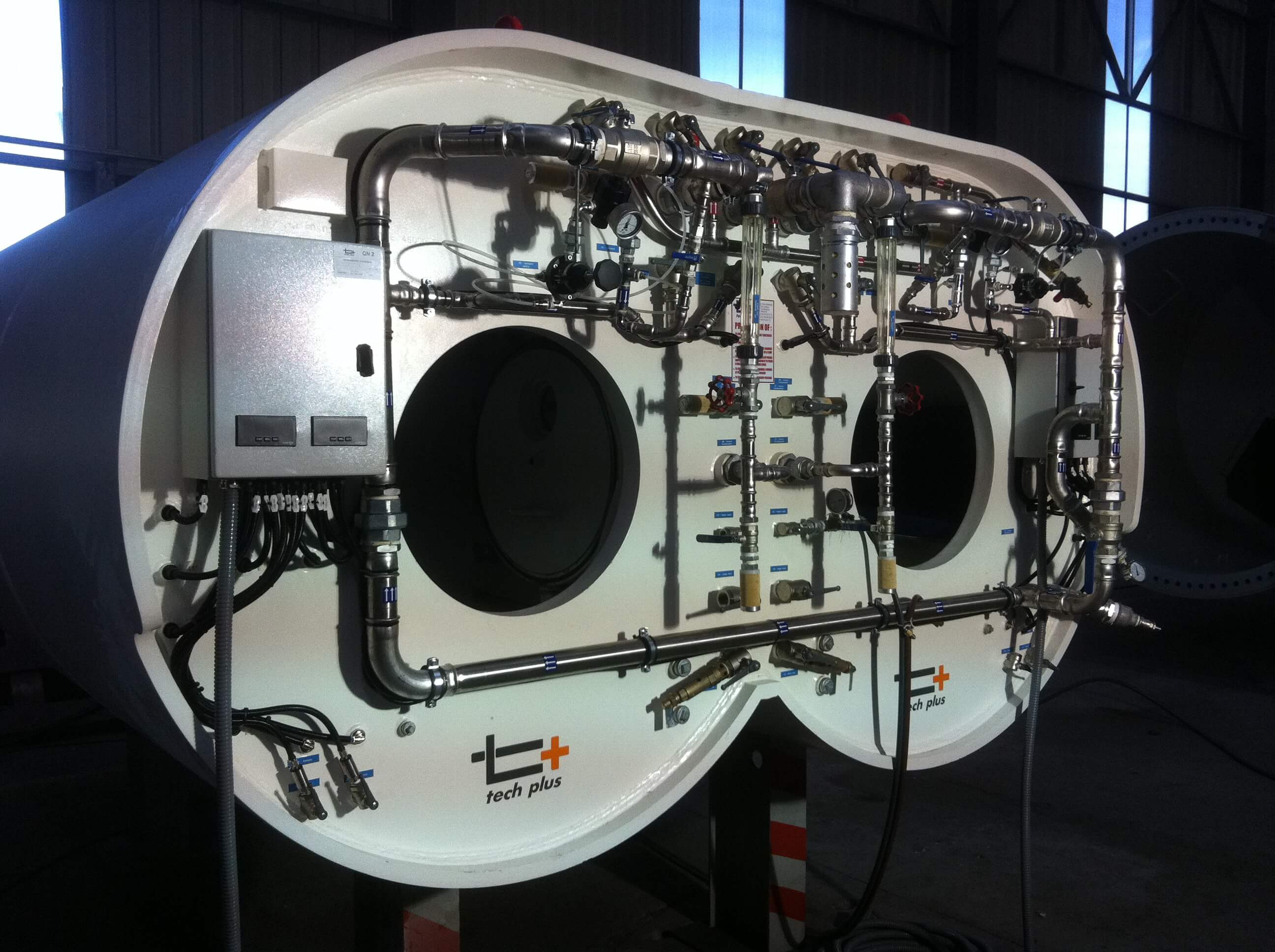 Compact two-person tunnel boring decompression chamber for underground mining operations