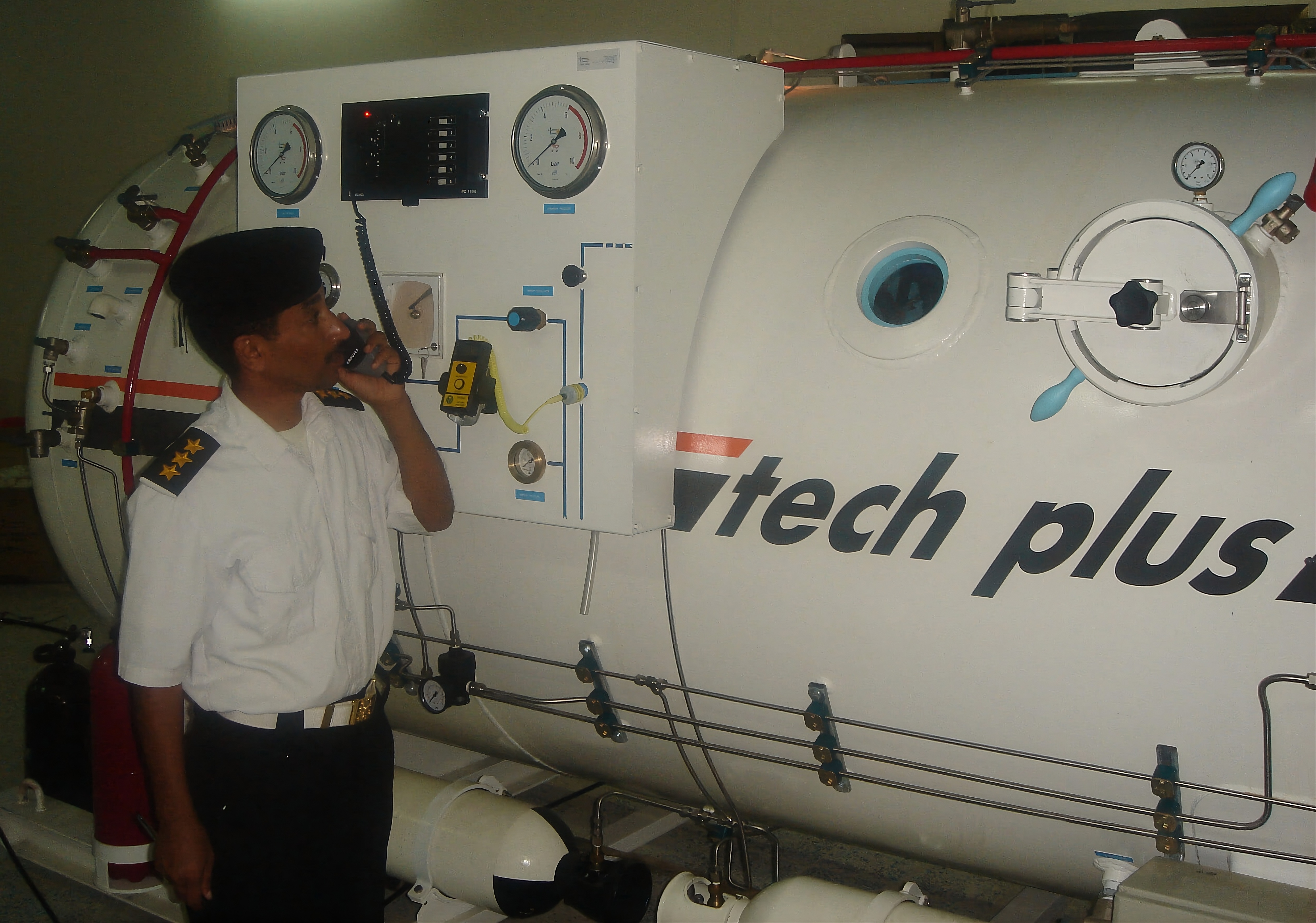 Naval diving chamber operation by military personnel for submarine rescue